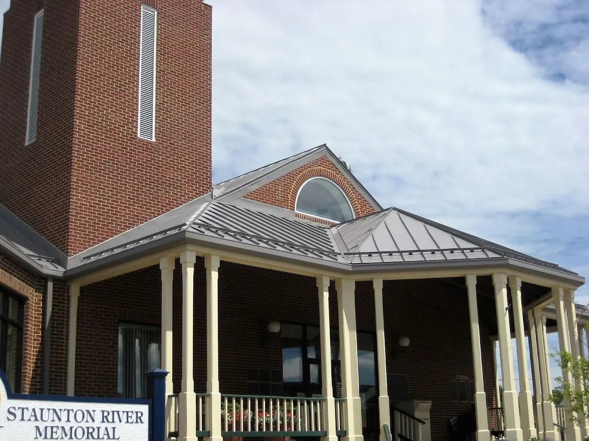 Skilled roofing craftsmen working on a residential roof in Maryville